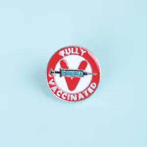 Fully Vaccinated Covid-19 enameled badge with syringe design on a blue background