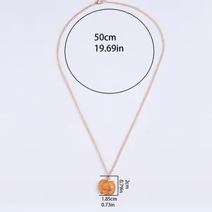 Collar con colgante de calabaza de Halloween, cadena dorada de 50cm y carita sonriente