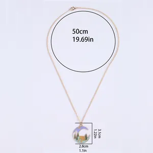 Golden crescent moon necklace with forest landscape pendant and 50cm chain link