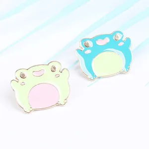 Cute cartoon frog enamel pins in green and blue alloy with gold plating