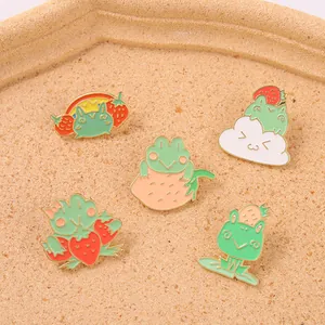 Set of 5 creative cartoon frog enamel pins featuring cute strawberry and cloud designs
