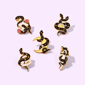 Set of five gothic enamel snake pins with skull, rose, moon, and dagger designs