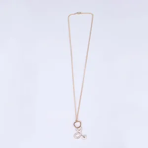 Creative stethoscope pendant necklace in gold finish with white medical theme charms