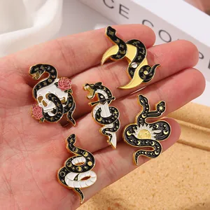 Set of five gothic snake enamel pins featuring skulls, roses, and daggers held in hand