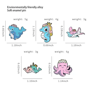 Guide des tailles pour 5 broches d'animaux marins: dauphin, hippocampe, raie et poulpe