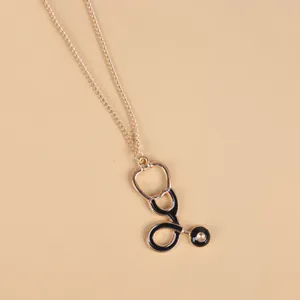 Creative stethoscope pendant necklace for medical professionals with gold and black finish