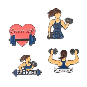 Vue détaillée de quatre pin's de fitness en émail avec haltères et silhouettes