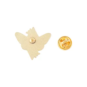 Golden alloy insect brooch back view with secure metal butterfly clutch closure