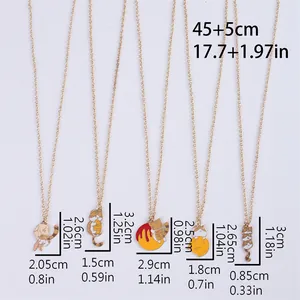 Cartoon cat pendants in gold alloy with enamel finish, including five cute designs