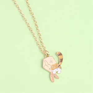 Charming gold-tone necklace with a creative cartoon cat pendant in colorful enamel finish