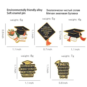 Enamel graduation pins set featuring graduation caps and floral designs on white background