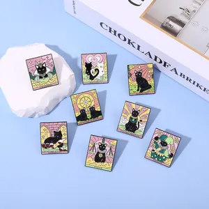 Set of eight cartoon black cat tarot enamel pins featuring colorful mystical designs