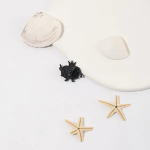 Cute apple prince enamel pin with crown and black rubber backing on decorative sea shells