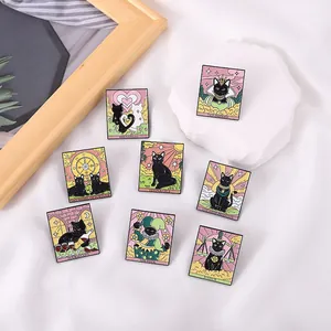 Black cat tarot card enamel pins collection featuring The Empress and The Lovers designs