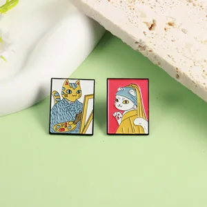 Set de broches en émail représentant des chats artistes sur un support en pierre