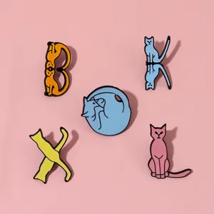 Cute cartoon cat enamel pins in various poses and colors for clothing or bags