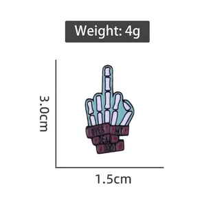 Skeletal hand enamel pin with Over My Dead Body text and dimensions for sizing