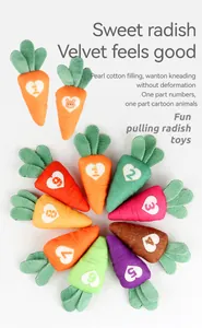 Close-up of colorful plush carrots with heart embroidery and numbers for early learning