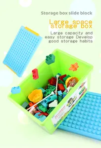 Green storage box with blue building base lids and colorful large blocks for kids