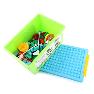 DIY large building blocks set with 72 pieces in a green storage box with blue baseplate lid