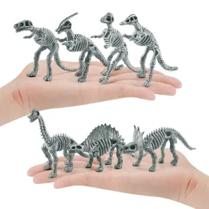 Mini dinosaur skeleton toy set including T-Rex and Triceratops fossil figurines in hand