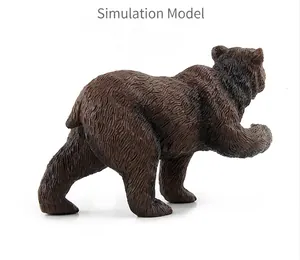 Detailed texture of dark brown grizzly bear figurine with realistic fur carving