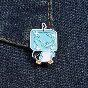 Cartoon blue square penguin enamel pin on denim fabric, cute creative animal metal badge