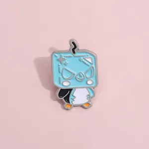 Detail of blue angry penguin enamel pin with black lighting bolt on a pink background