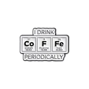 Cartoon enamel pin featuring a scientific periodic table coffee design in white finish