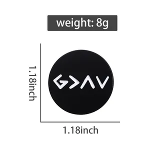Detail of a 1.18 inch black metal badge with G > ^ V symbols weighing 8g for clothes