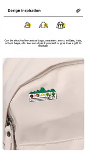 Close-up of sliding weather mood enamel pin with mountains on a beige canvas bag
