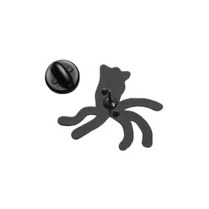 Detailed back view of an octopus enamel pin with matte black finish and rubber backing