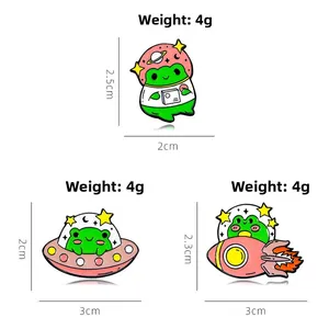 Detailed view of frog astronaut enamel pin set with size and 4g weight specifications