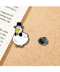 Detailed macro view of a gentleman duck enamel pin with a metal butterfly clutch back