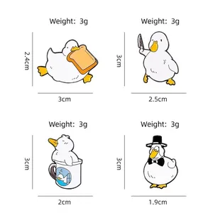 Set of four cute cartoon duck enamel pins in various poses with size and weight details