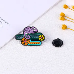 Cartoon enamel chameleon brooch on cactus branch with Extrovert text for backpacks