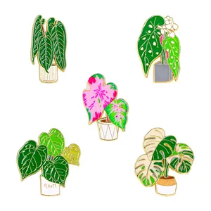 Five creative cartoon enamel plant brooches featuring monstera and leafy potted designs