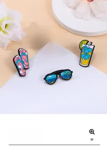 Detailed macro view of summer enamel pins featuring sun, drinks, sunglasses, and flip-flops