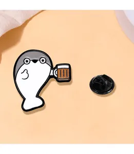 Detail of cartoon seal enamel pin holding beer with glasses and black rubber clutch
