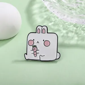Square cartoon enamel brooch featuring a cute white rabbit holding a carrot charm