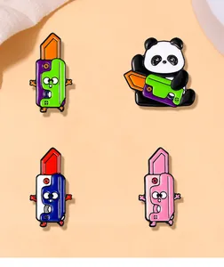 Detailed close-up of colorful panda and cartoon utility knife enamel brooch set