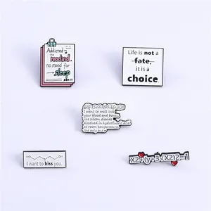 Set of five chemistry and math enamel pins with inspirational quotes on white background