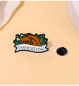 Macro detail of enamel turkey pin with Happy Thanksgiving banner and black rubber backer