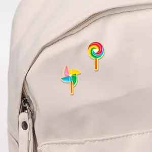 Lollipop and windmill enamel pin set on canvas backpack for cute fashion decoration