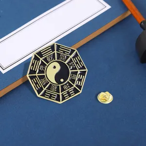Traditional Bagua Tai Chi enamel brooch pin in black and gold alloy for clothing decoration