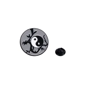 Classic Yin Yang Tai Chi dragon brooch in black and white enamel with butterfly clutch