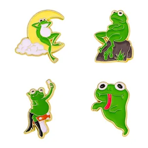 Set of four cute cartoon green frog enamel pins for backpacks and clothing decoration