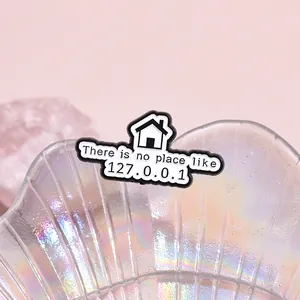 Geek culture enamel pin with 127.0.0.1 house design on an iridescent glass dish