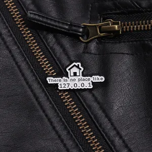 Macro view of a 127.0.0.1 enamel pin badge pinned on a black leather jacket