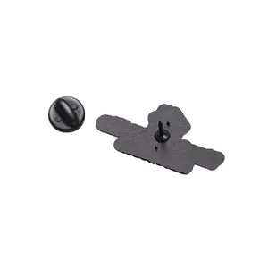 Macro view of matte black alloy brooch back with secure rubber clutch backings